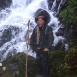 John beside the waterfall