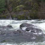 The Water sloshing over the rocks